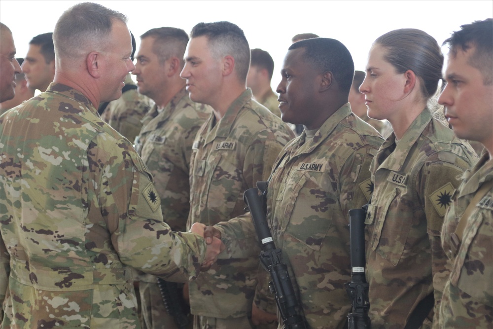 Task Force Wolfpack Soldiers receive the combat patch