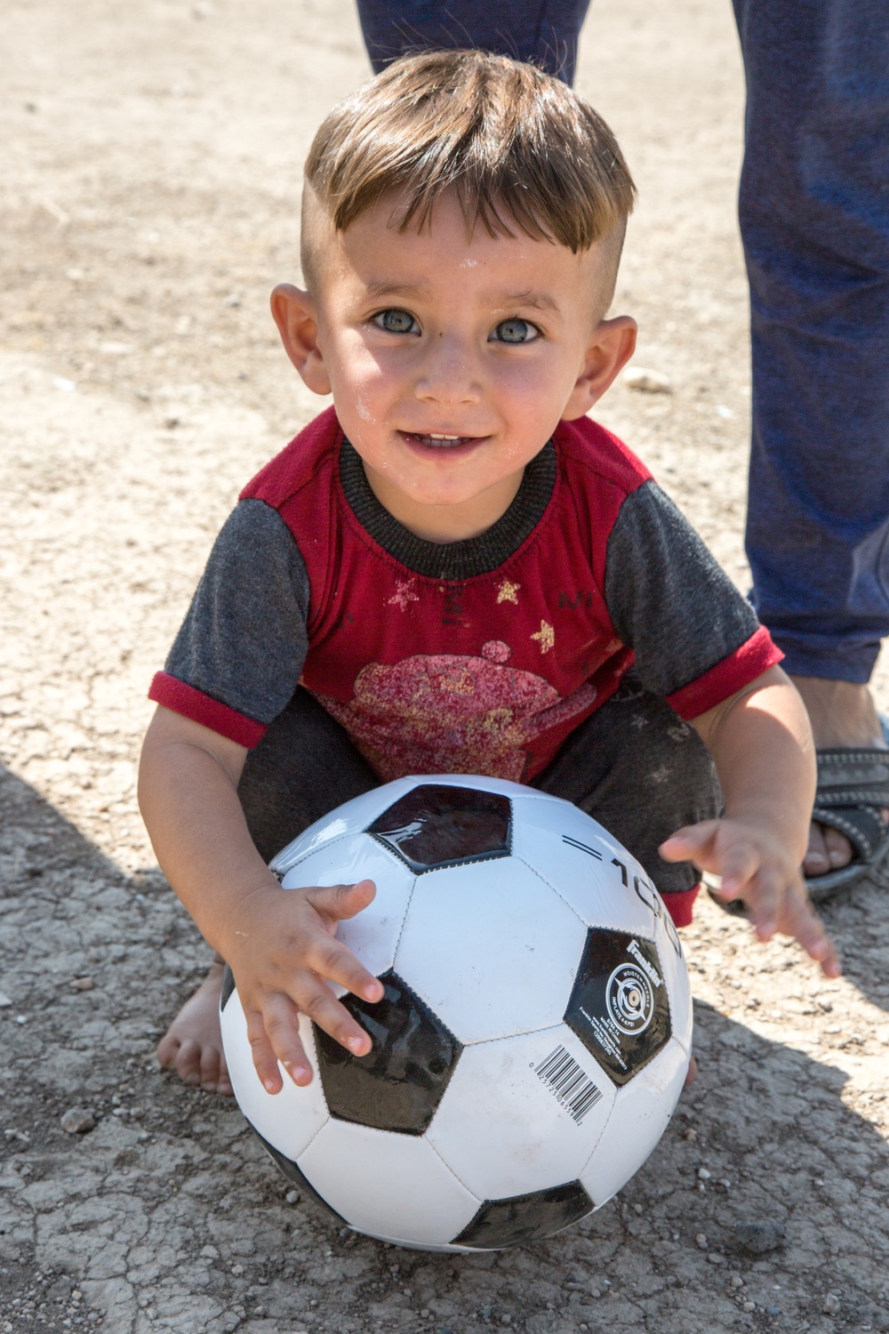 A Kid and His Ball