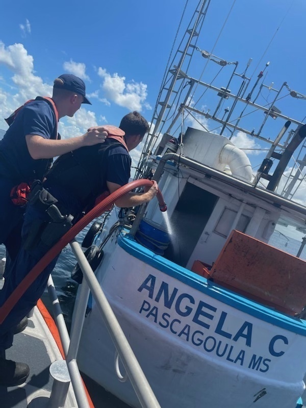 Coast Guard, partner agency rescue 2 from boat fire east of the Skyway Bridge