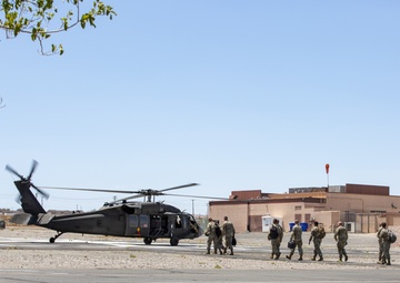 Senior Army leaders board a UH 60 Blackhawk aboard MCLB Barstow