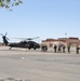 Senior Army leaders board a UH 60 Blackhawk aboard MCLB Barstow