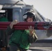 Naval Aircrewman (Helicopter) Steven Leib, assigned to Helicopter Sea Combat Squadron (HSC) 23, offloads an MH-60S Sea Hawk aboard expeditionary sea base USS Miguel Keith (ESB 5)