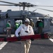 Chief Aviation Electricians’s Mate Carlos Ramos, assigned to Helicopter Sea Combat Squadron (HSC) 23, offloads an MH-60S Sea Hawk aboard expeditionary sea base USS Miguel Keith (ESB 5)