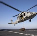 An MH-60S Sea Hawk from Helicopter Sea Combat Squadron (HSC) 23 conducts a vertical replenishment aboard expeditionary sea base USS Miguel Keith (ESB 5)