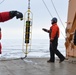 Coast Guard Cutter Healy crew members recover oceanographic research moorings