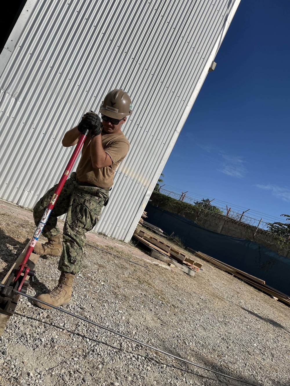 U.S. Navy Seabees with NMCB-5's Timor-Leste build a schoolhouse to support the local Ministry of Education