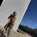 U.S. Navy Seabees with NMCB-5's Timor-Leste build a schoolhouse to support the local Ministry of Education