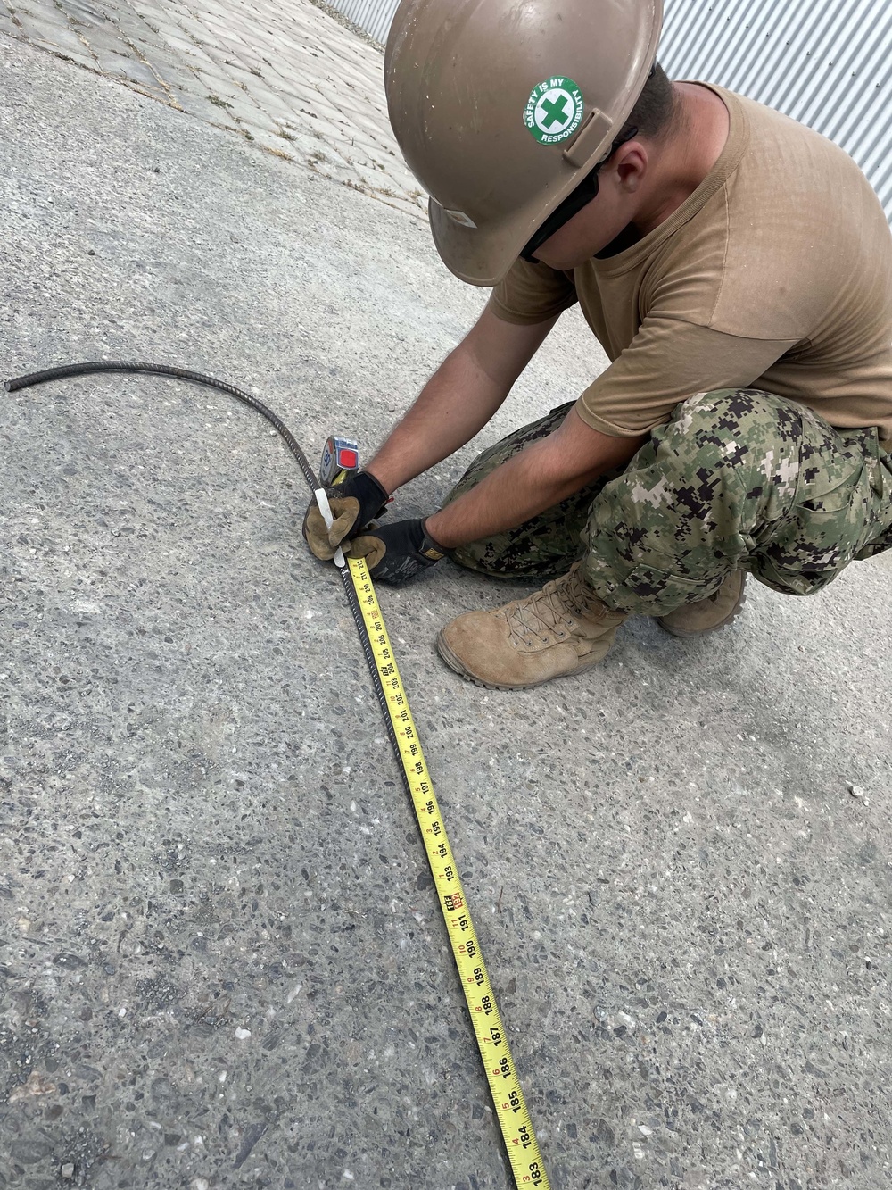 U.S. Navy Seabees with NMCB-5's Timor-Leste build a schoolhouse to support the local Ministry of Education