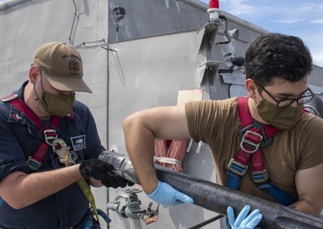 Maintenance on MK-46 gun weapon system