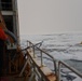 Coast Guard Cutter Healy crew members recover oceanographic research moorings