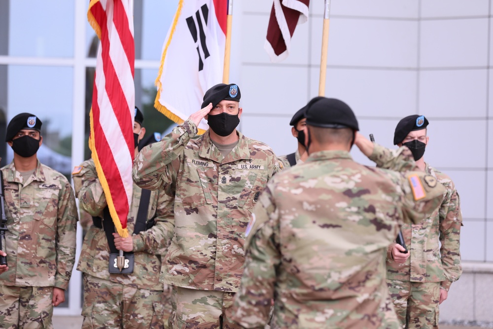 The new 502nd Field Hospital Senior Enlisted Advisor salutes the commander