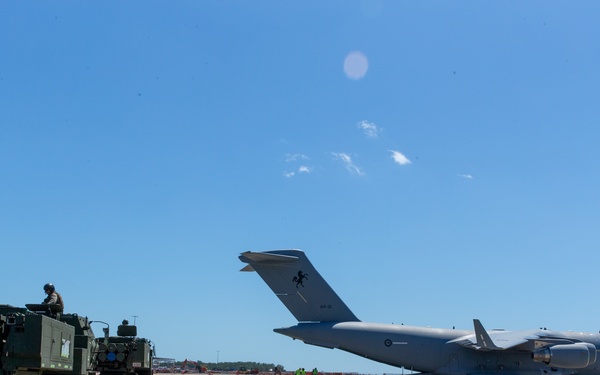 HIMARS loading onto a C-17 during Exercise Loobye