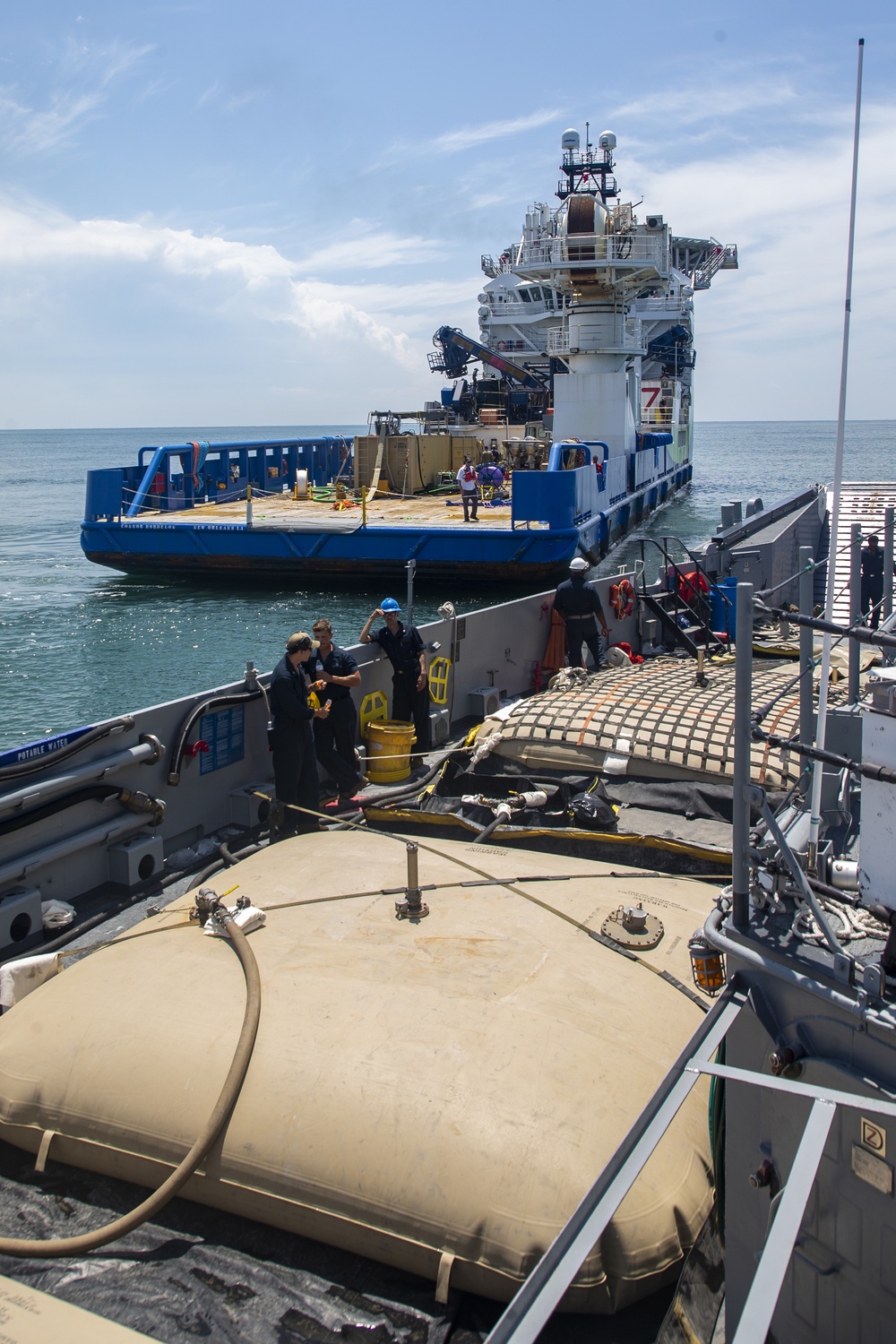 U.S. Marines and Sailors conduct at-sea live fuel transfer