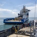 U.S. Marines and Sailors conduct at-sea live fuel transfer