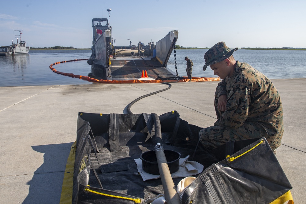 U.S. Marines and Sailors conduct at-sea live fuel transfer