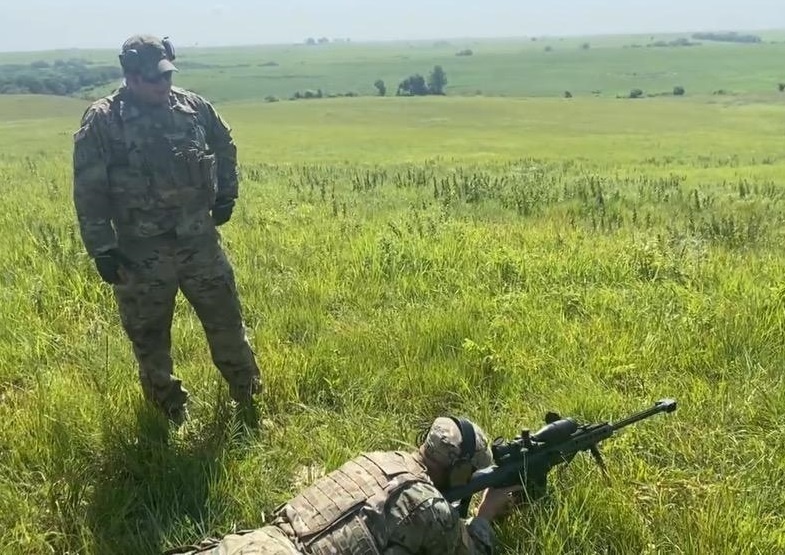Army EOD Soldiers use sniper rifle for standoff munitions disruption training