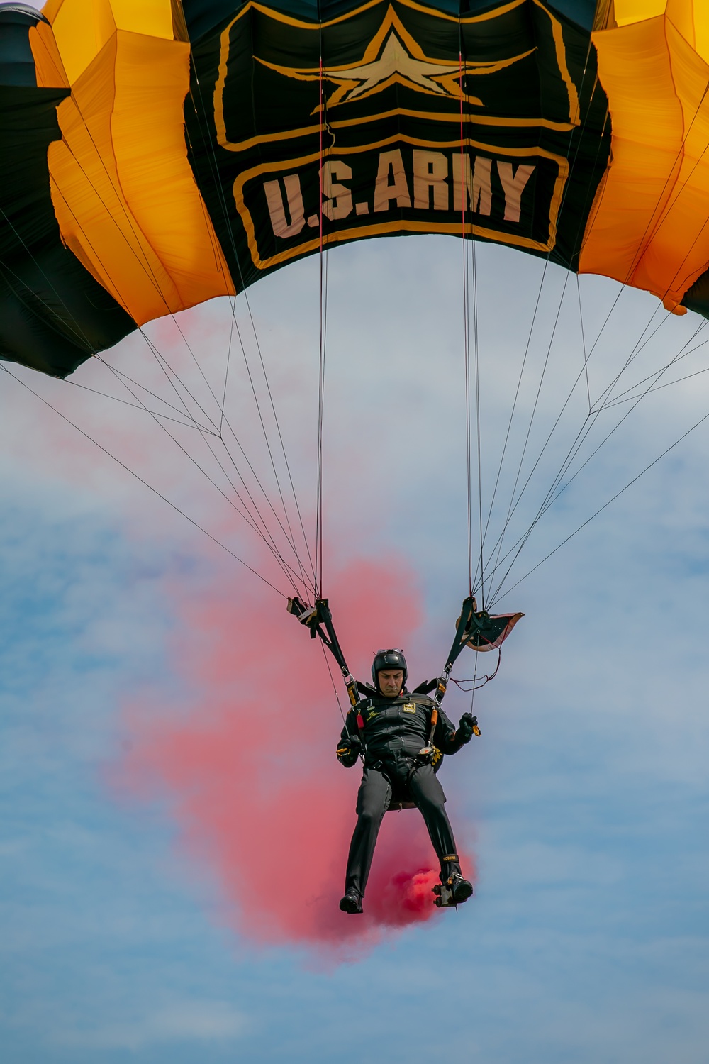 U.S. Army Parachute Team Soldier parachutes into Airborne Day festivities