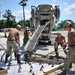 Seabees and Marines place two concrete pads on board Marine Corps Base Camp Lejeune, NC