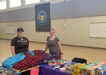 Family Program volunteers provide school supplies