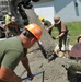 Seabees and Marines place two concrete pads on board Marine Corps Base Camp Lejeune, NC