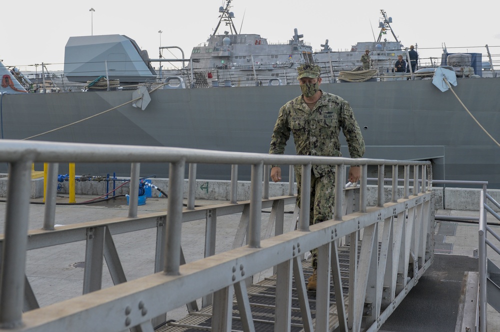 Task Force LCS arrives aboard USS Kansas City (LCS 22)