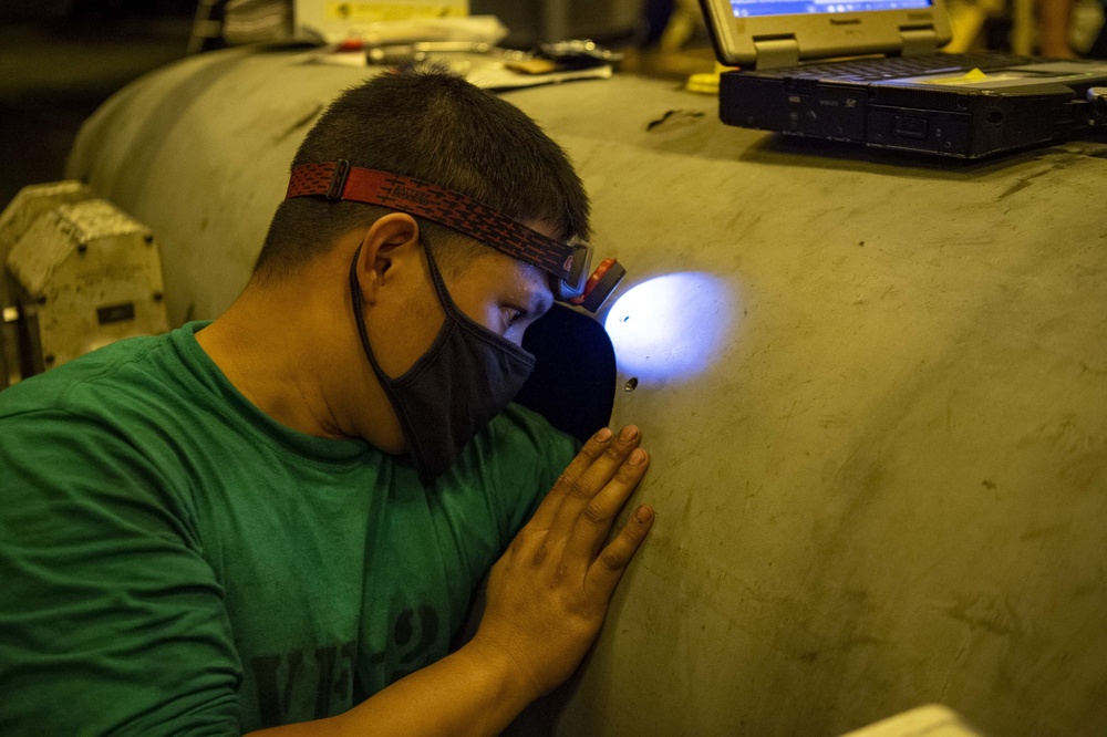 USS Carl Vinson (CVN 70) Sailor Conducts Maintenance