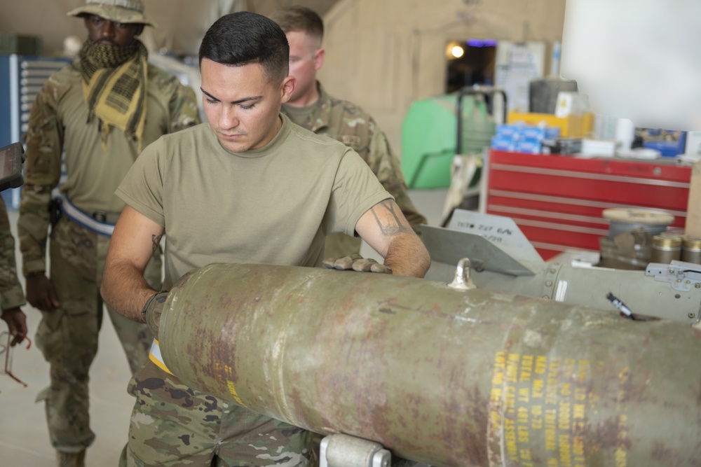 332nd EMXS Airmen assemble a guided missile