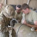 332nd EMXS Airmen assemble a guided missile