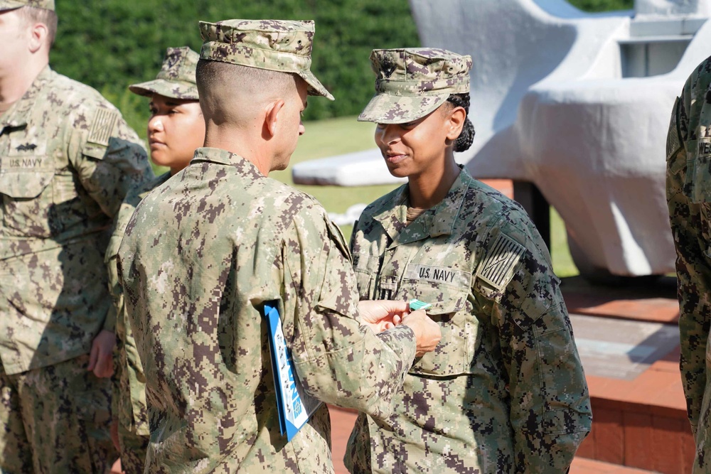 Lt. Tonesha M. Lee Receives Commendation Medal from Capt. Greg Vinci