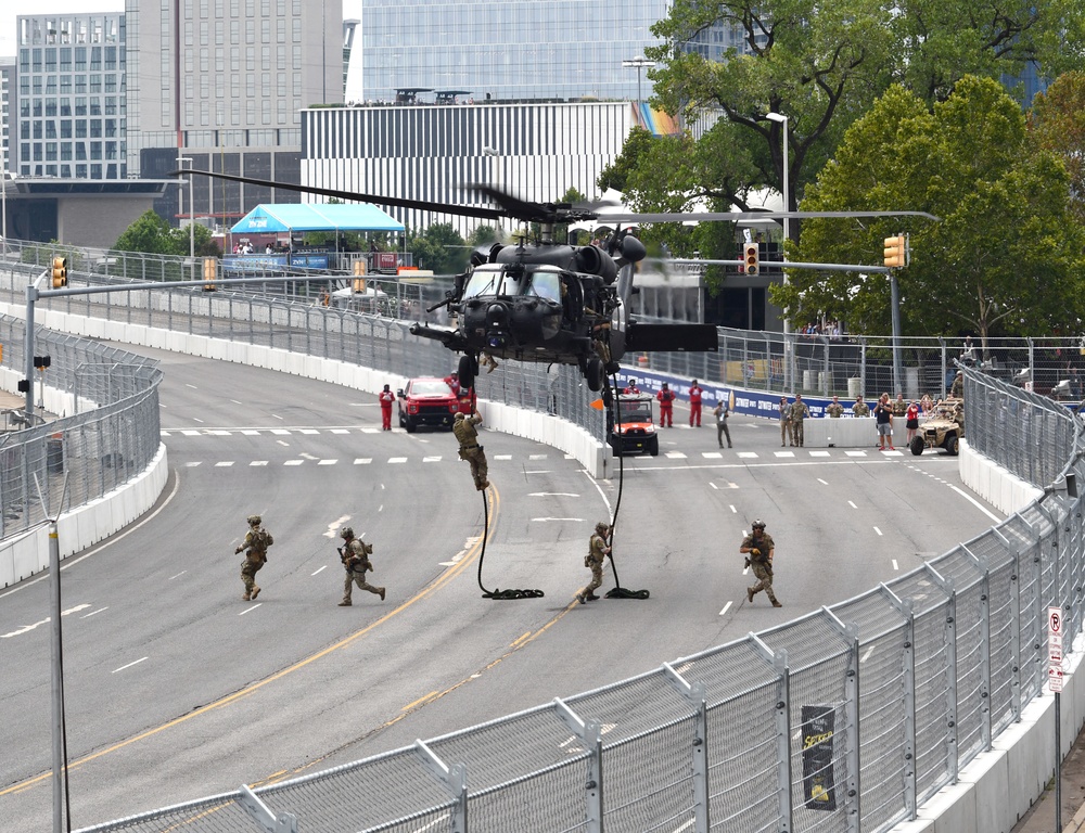 5th Special Forces Group team members fats rope into the Big Machine Grand Prix