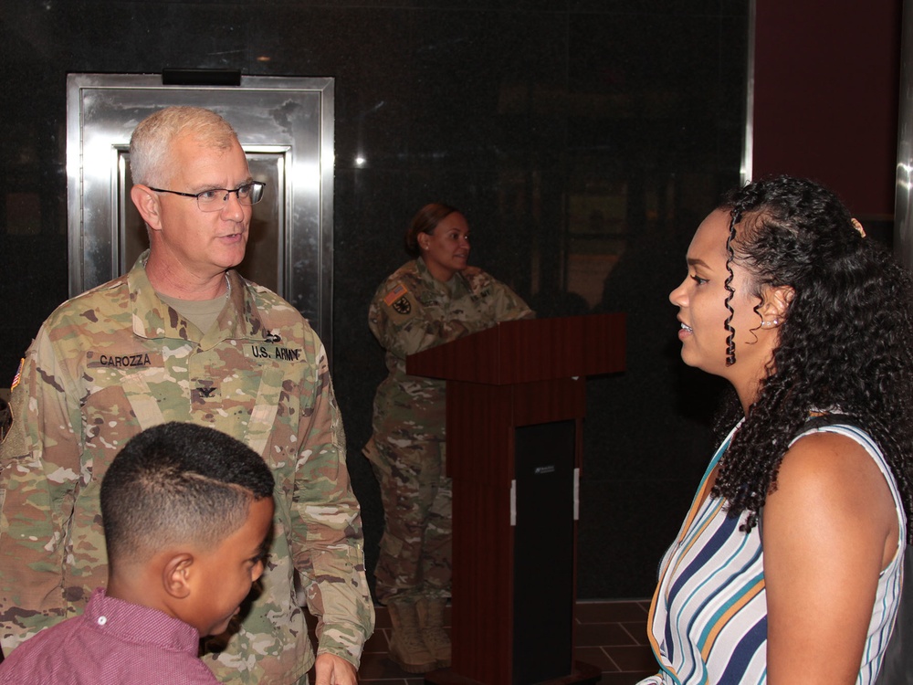 Carozza chats with Baldwin family