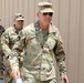 Brig. Gen. Ronald Burkett visits Camp Buehring and coins three Task Force Phoenix Soldiers