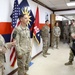 Brig. Gen. Ronald Burkett visits Camp Buehring and coins three Task Force Phoenix Soldiers