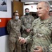 Brig. Gen. Ronald Burkett visits Camp Buehring and coins three Task Force Phoenix Soldiers