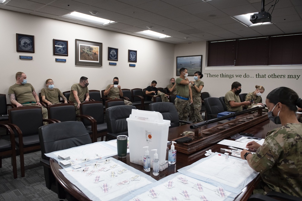 23rd MDG hosts mass vaccine line