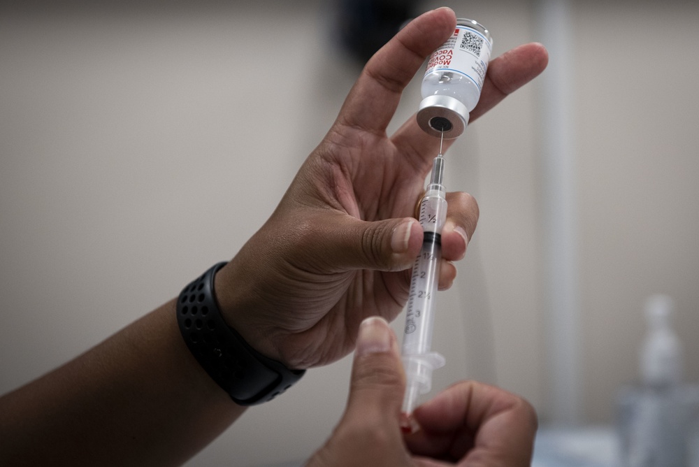 23rd MDG hosts mass vaccine line