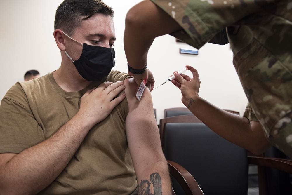 23rd MDG hosts mass vaccine line