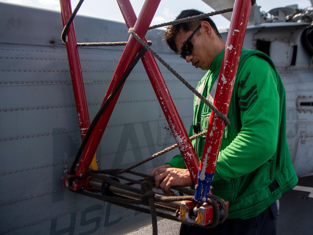 HSC 23 maintainers tow MH-60s Seahawk