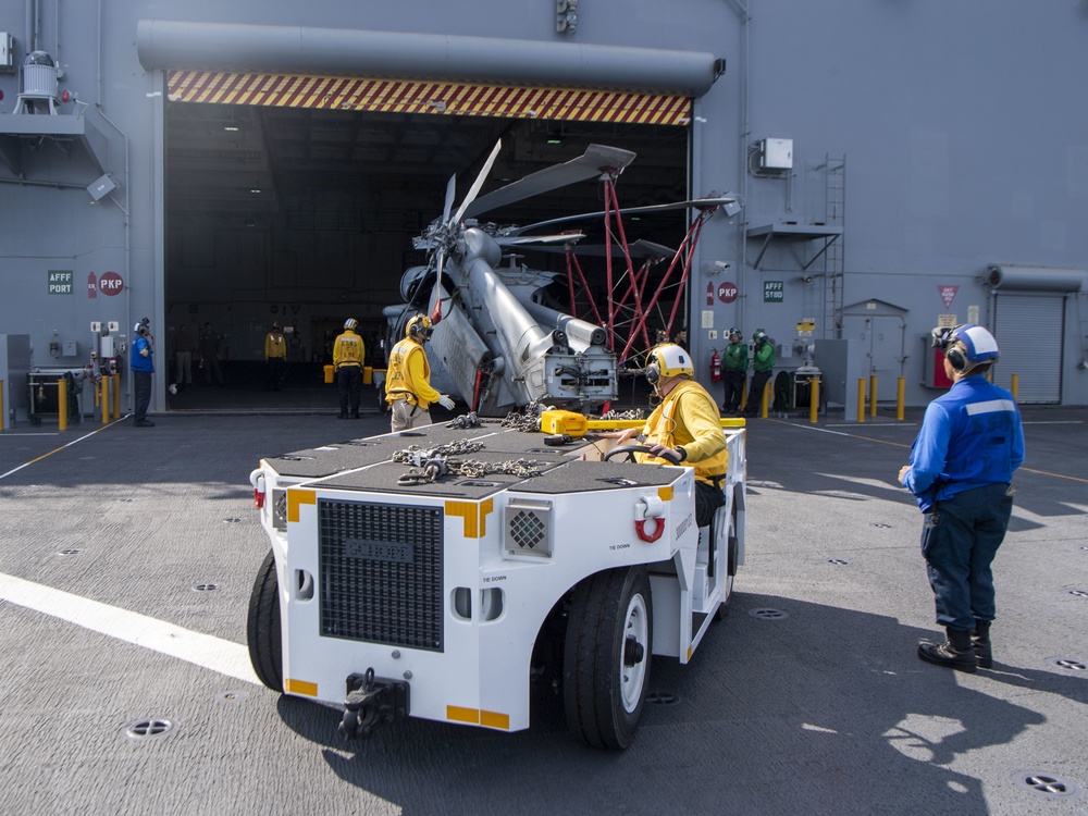 HSC 23 maintainers tow MH-60s Seahawk