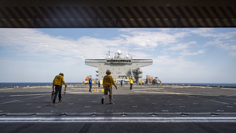 HSC 23 maintainers tow MH-60s Seahawk