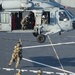 HSC 23 conducts fast rope excersises with USCG MSRT aboard USS Miguel Keith