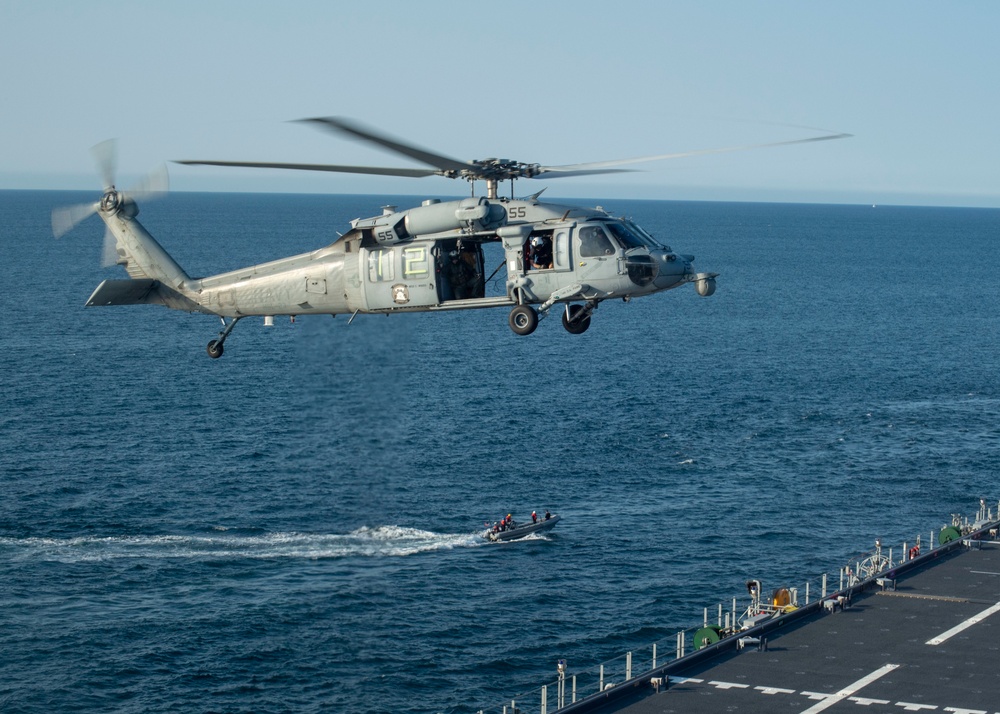 HSC 23 conducts fast rope excersises with USCG MSRT aboard USS Miguel Keith