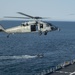 HSC 23 conducts fast rope excersises with USCG MSRT aboard USS Miguel Keith