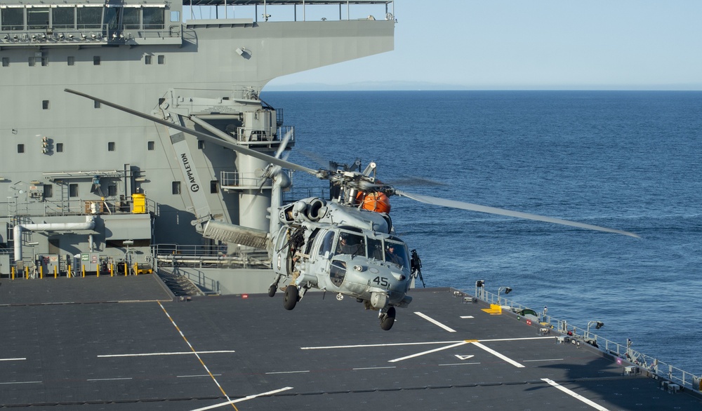 HSC 23 conducts fast rope excersises with USCG MSRT aboard USS Miguel Keith