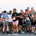 Soldiers participate in a 4th of July Super Hero 5K Fun Run/Walk at Camp Buehring, Kuwait