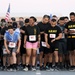 Soldiers participate in a 4th of July Super Hero 5K Fun Run/Walk at Camp Buehring, Kuwait