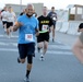 Soldiers participate in a 4th of July Super Hero 5K Fun Run/Walk at Camp Buehring, Kuwait