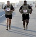 Soldiers participate in a 4th of July Super Hero 5K Fun Run/Walk at Camp Buehring, Kuwait