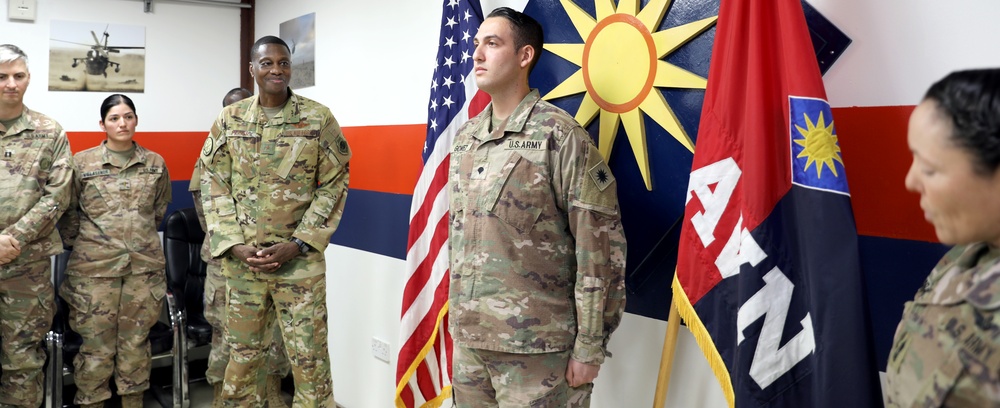 Brig. Gen. Brandon Parker coins Soldiers of Task Force Phoenix at Camp Beuhring, Kuwait