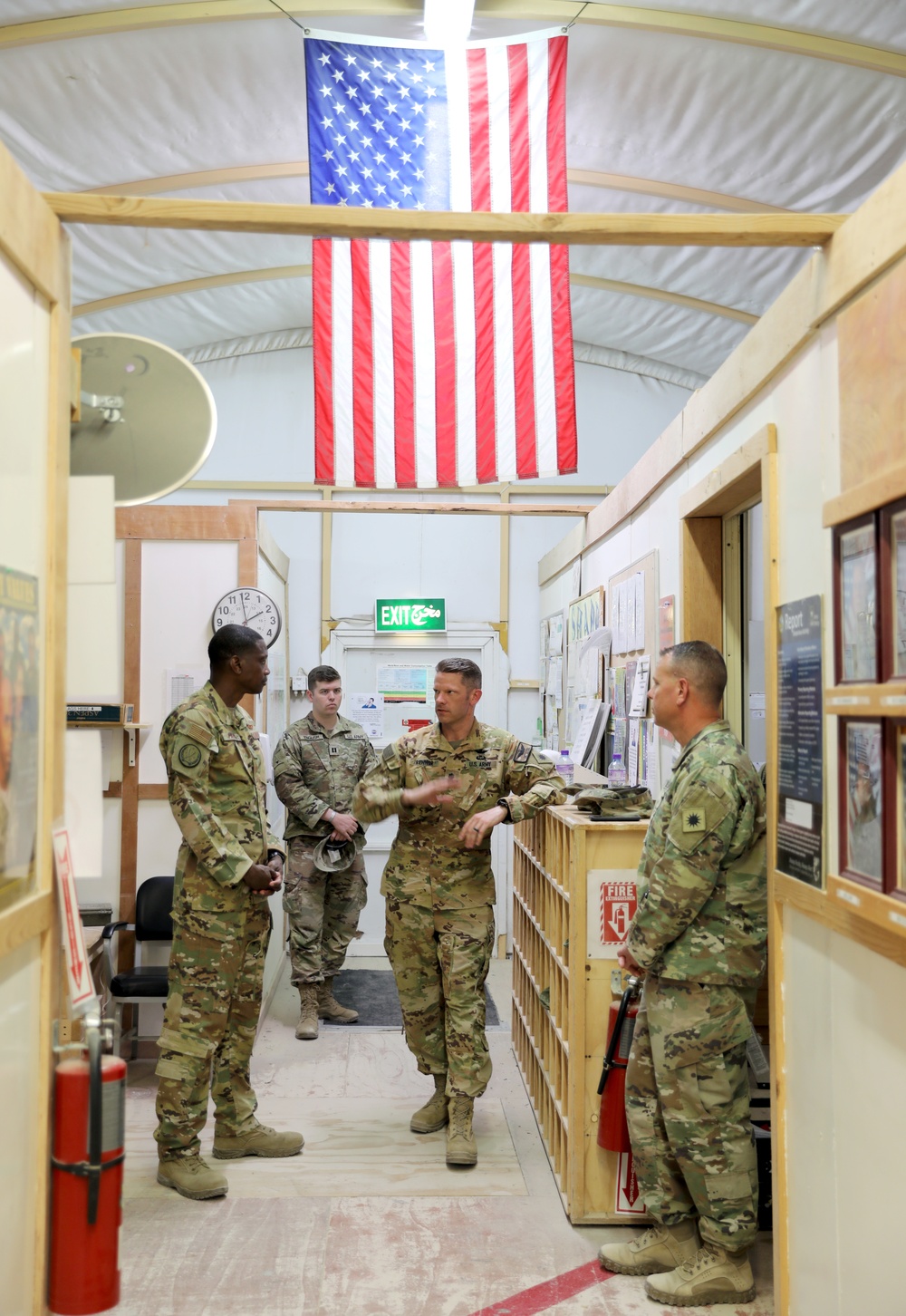 Brig. Gen. Brandon Parker coins Soldiers of Task Force Phoenix at Camp Beuhring, Kuwait